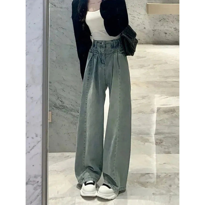 Jeans femmes taille haute à coupe large avec un design de ceinture élégant Chic & Stil