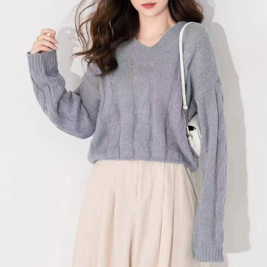 Pull tricoté pour femmes avec motif en tresse et col en V Chic & Stil