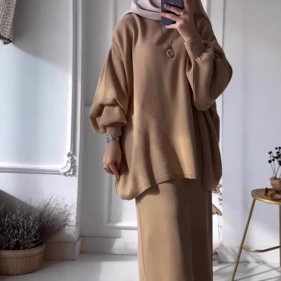 Elegant set for women made up of a casual sweater and a chic midi skirt.