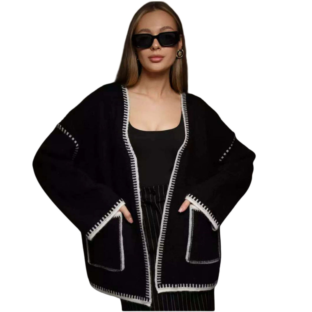 Thick knitted coat for women with practical belt and pockets Lune London