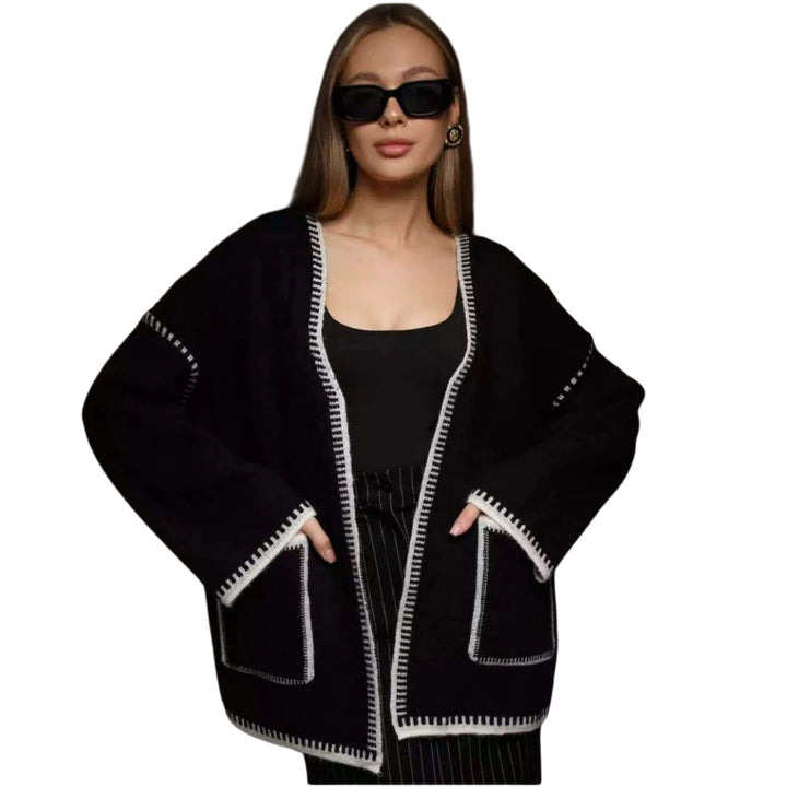 Thick knitted coat for women with practical belt and pockets Lune London