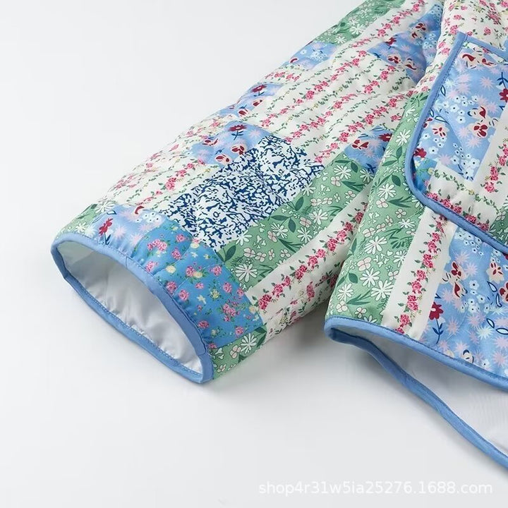 Veste matelassée patchwork pour femmes avec design floral et poches latérales pratiques Chic & Stil