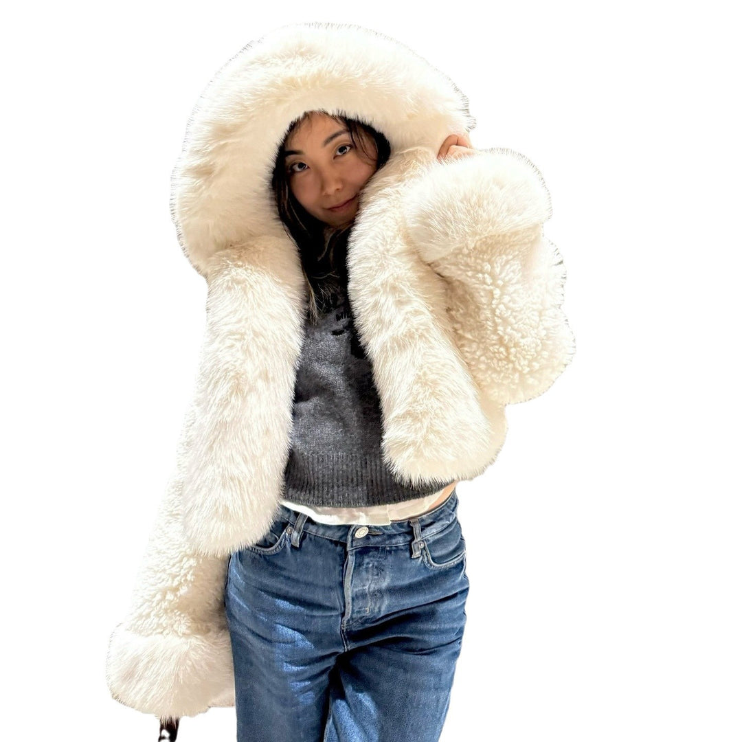 Women's short jacket made of voluminous faux fur with XXL hood and ball sleeves Amarae