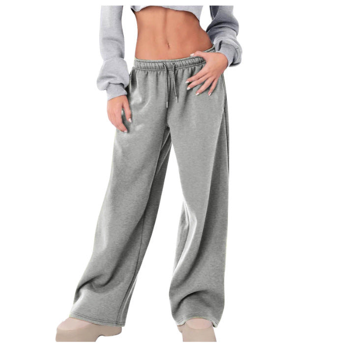 Women's loose casual pants with elastic waistband and side pockets Chic & Stil