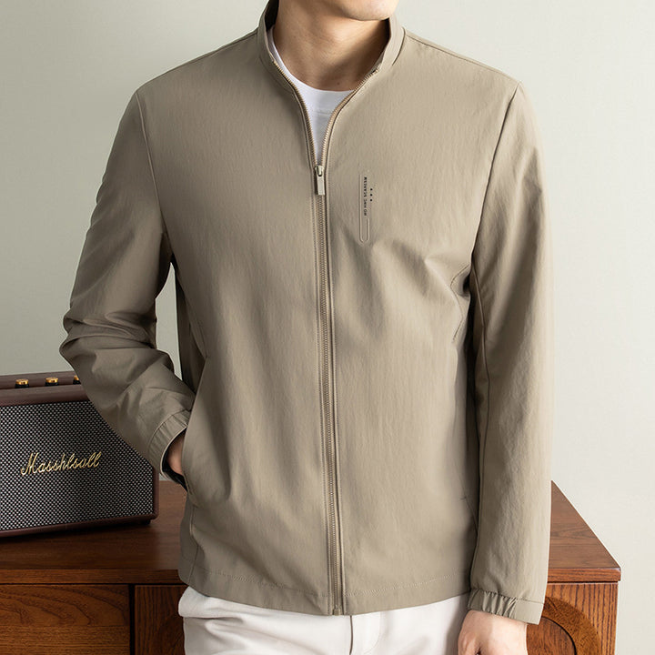 Men's lightweight technical transitional jacket with stand-up collar, wind- and water-repellent surface, and elastic cuffs Amarae