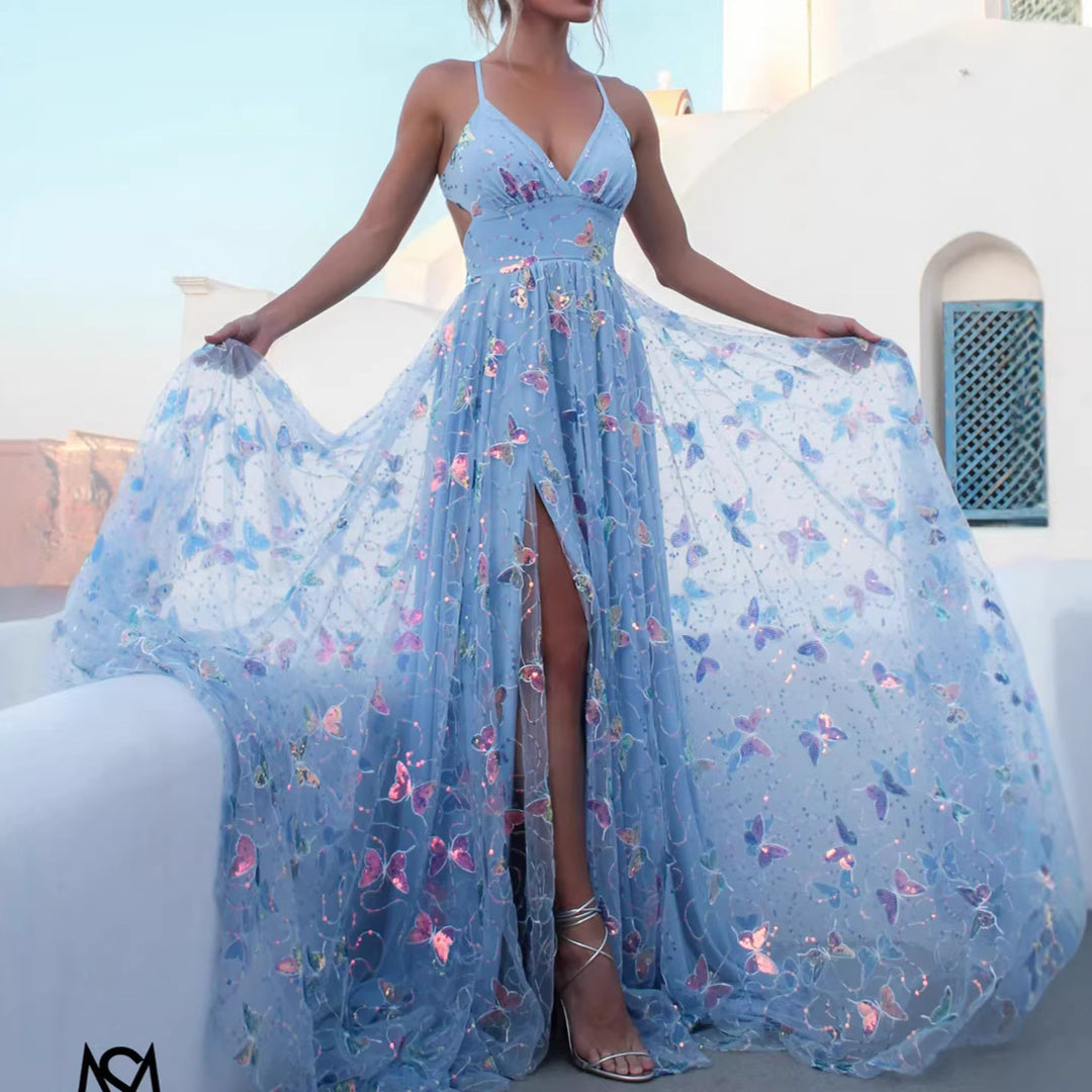Ladies maxi dress with delicate glitter accents and floral cut