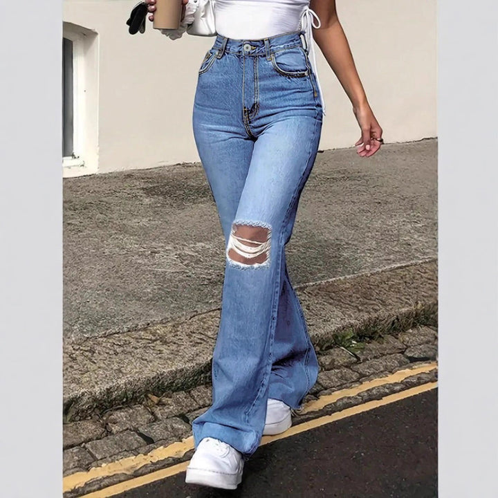 Ladies High-Waisted Flared Jeans in Retro Cut with Knee Rip and Extended Hem Amarae