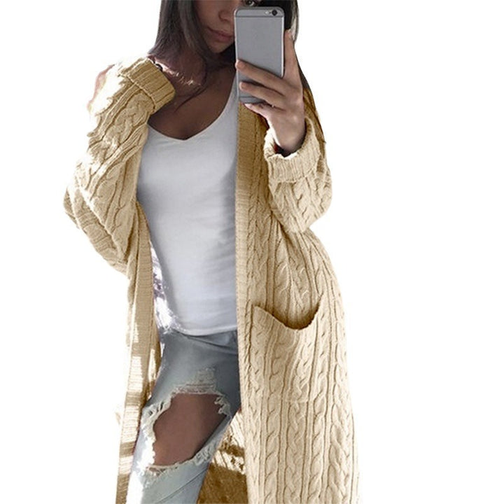Knitted coat for women with cable pattern and practical pockets Lune London