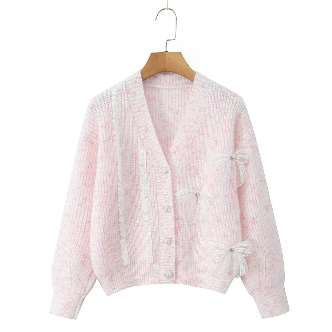 Women's knitted jacket with decorative knots and a delicate pattern Lune London