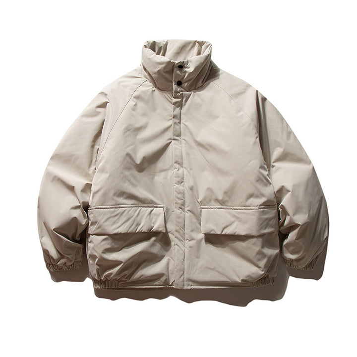 Unisex Boxy Padded Transition Jacket with High Stand-Up Collar, Elastic Cuffs and Flap Pockets Amarae