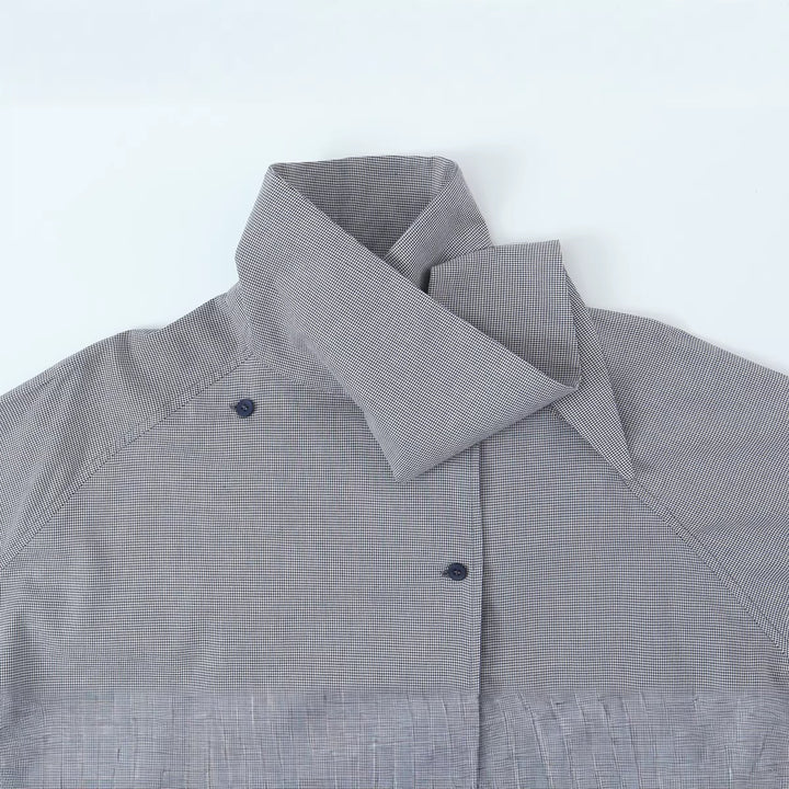 Women's oversized blouse with high shawl collar and asymmetrical button placket Amarae