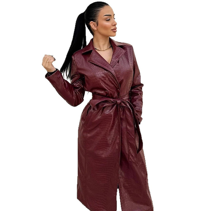Women's long coat made of faux leather with crocodile embossing and waist belt Amarae