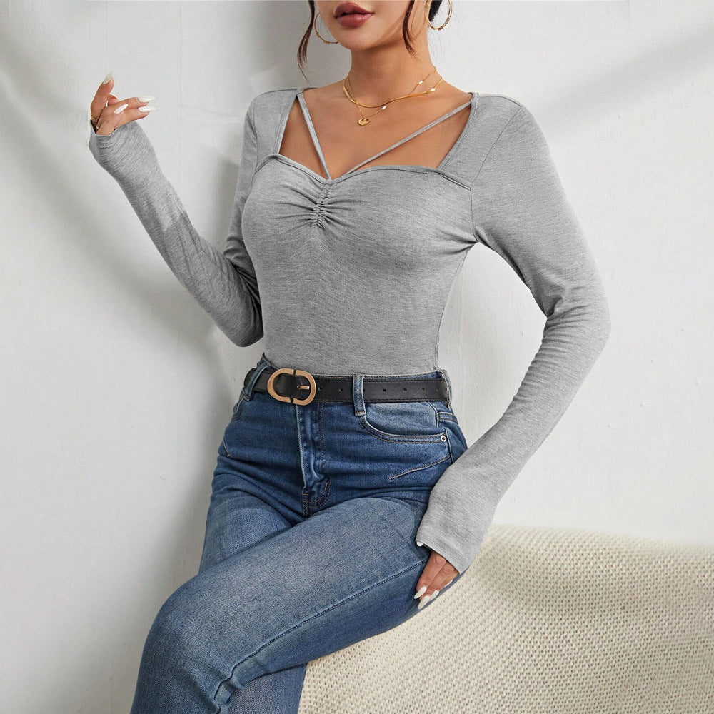 Body à manches longues pour femme avec décolleté en V tendance et détails raffinés aux épaules Chic & Stil