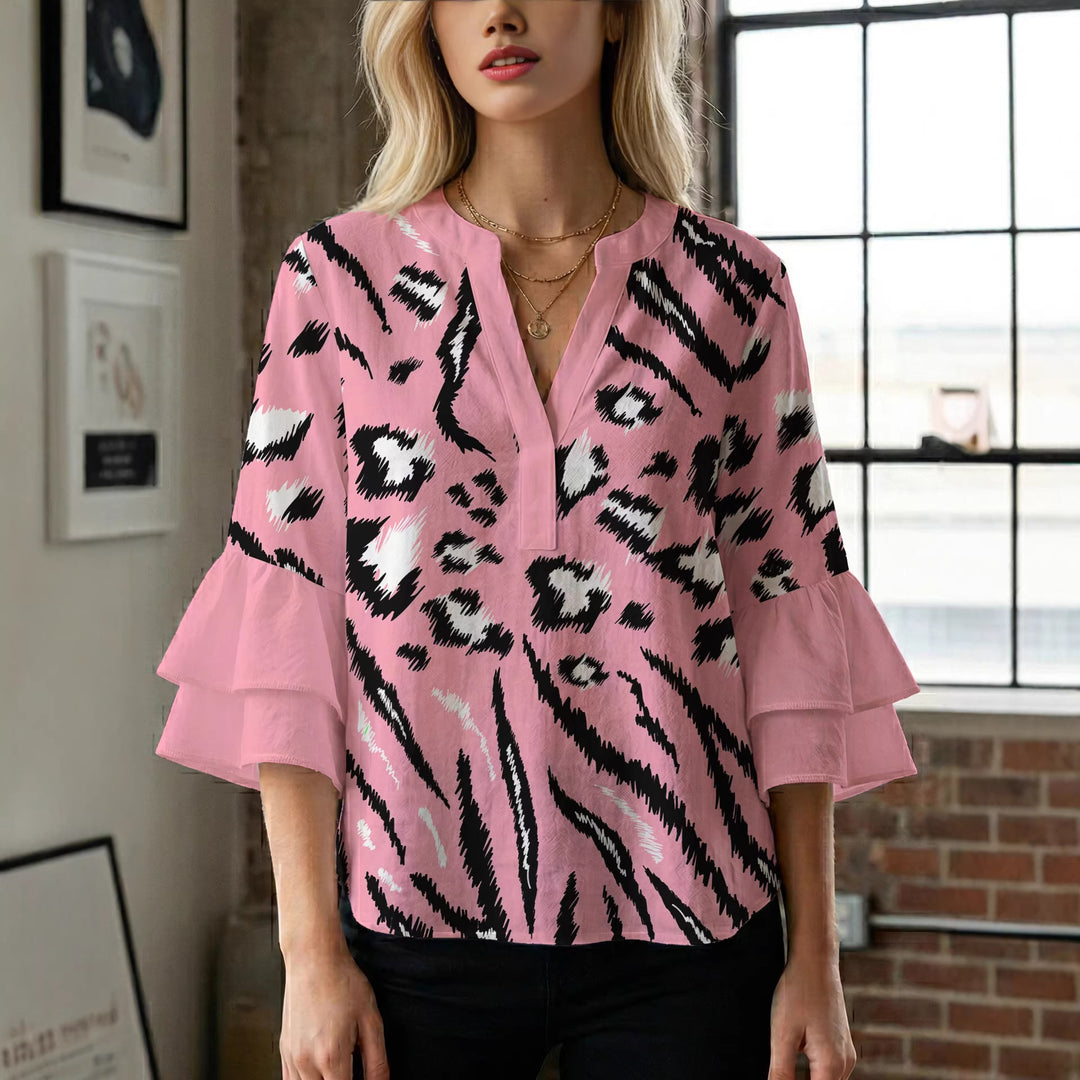 Women's blouse with ruffle details and eye-catching animal print Lune London