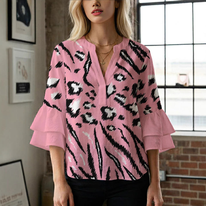 Women's blouse with ruffle details and eye-catching animal print Lune London