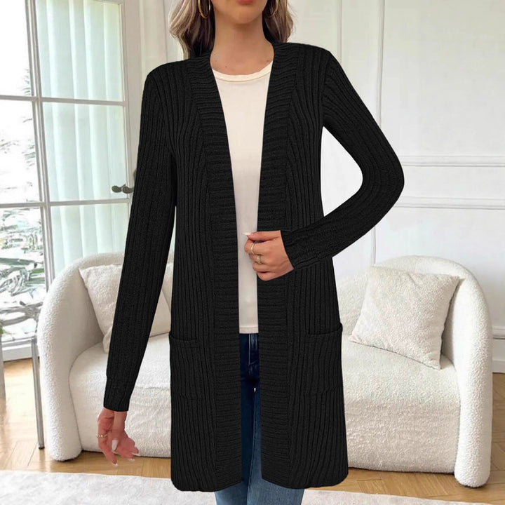 Knitted women's jacket with asymmetrical hem and practical pockets Lune London