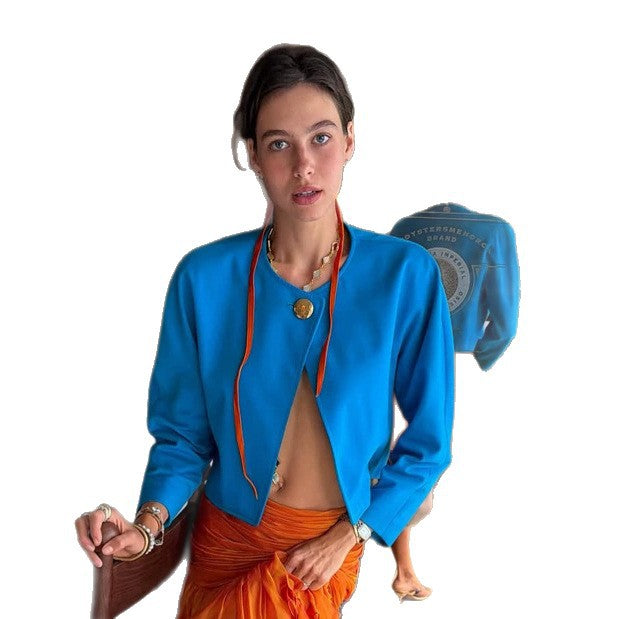 Women's short blazer in bolero style with structured silhouette and decorative button Amarae