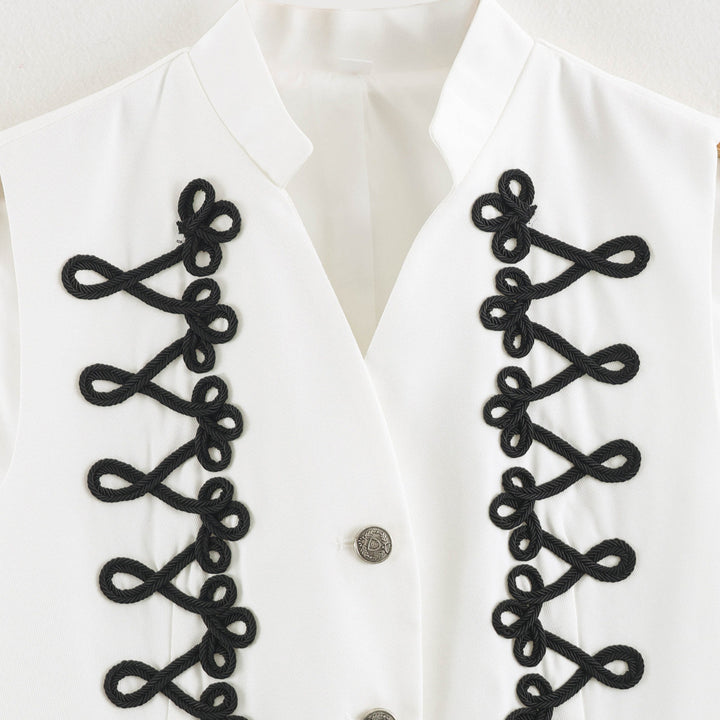 Women's sleeveless vest in uniform style with decorative frog closures and stand-up collar Amarae