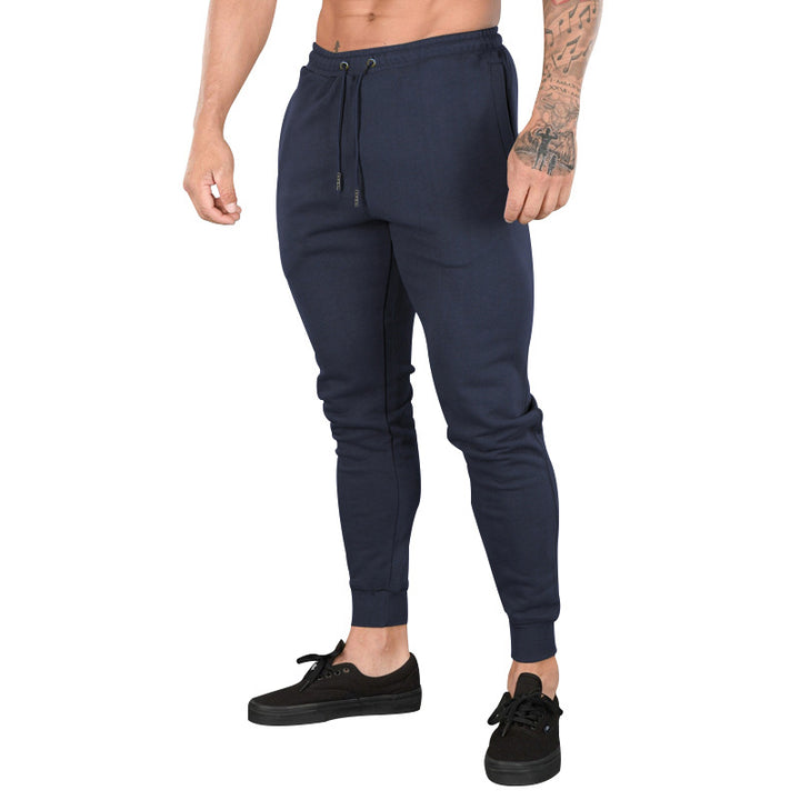 Men's sporty jogger pants with elastic waistband and practical zip pockets Lune London