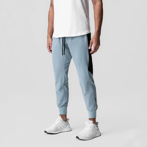 Men's athletic training pants with chic side contrast panels