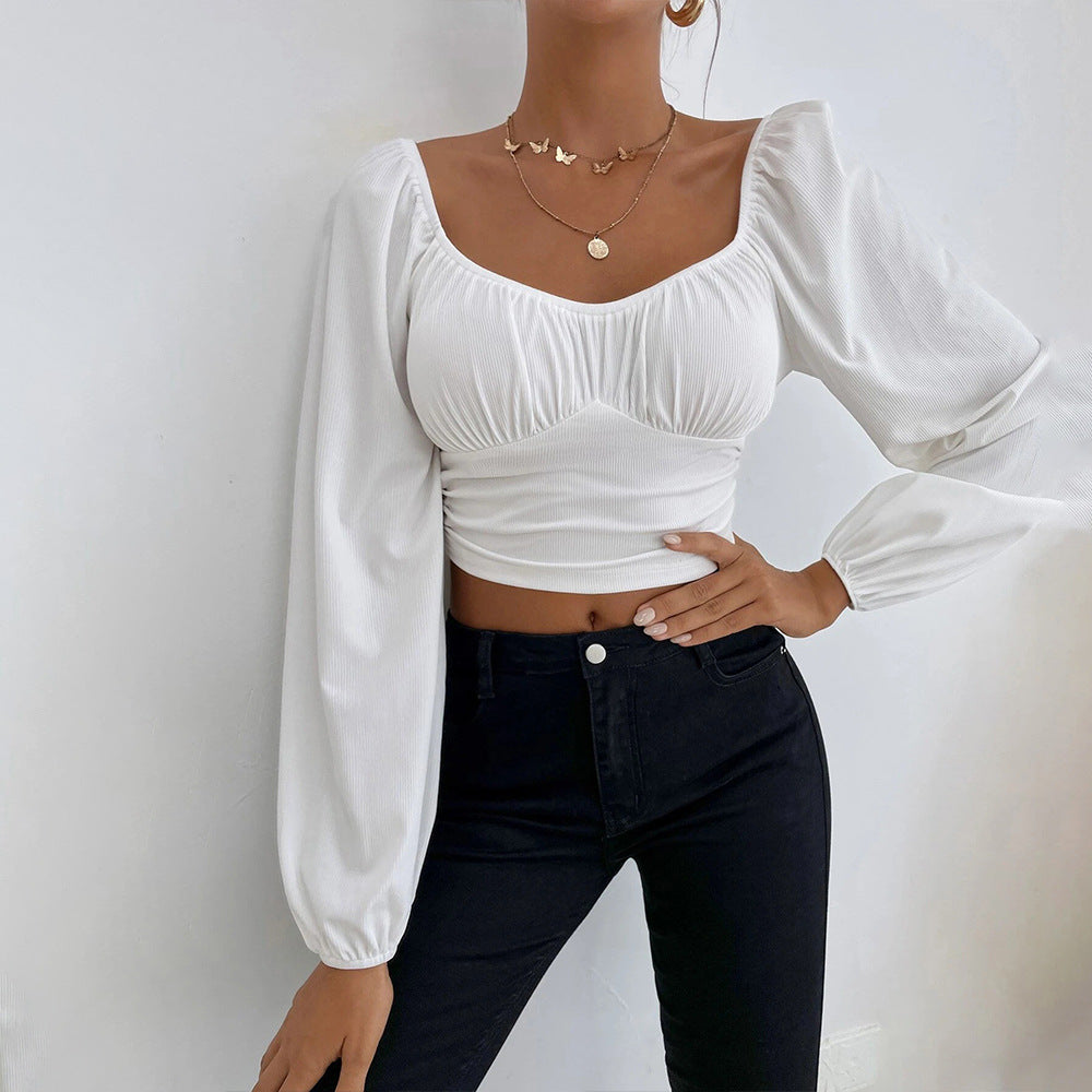 Haut court pour femmes avec un design de manches bouffantes élégant et une coupe ajustée Chic & Stil