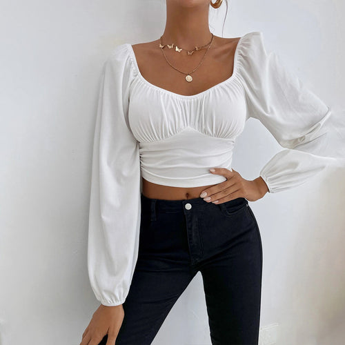 Haut court pour femmes avec un design de manches bouffantes élégant et une coupe ajustée Chic & Stil
