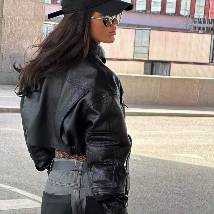 Women Cropped Boxy Biker Jacket made of vegan leather with high standing collar, zippered pockets & buckle detail Amarae