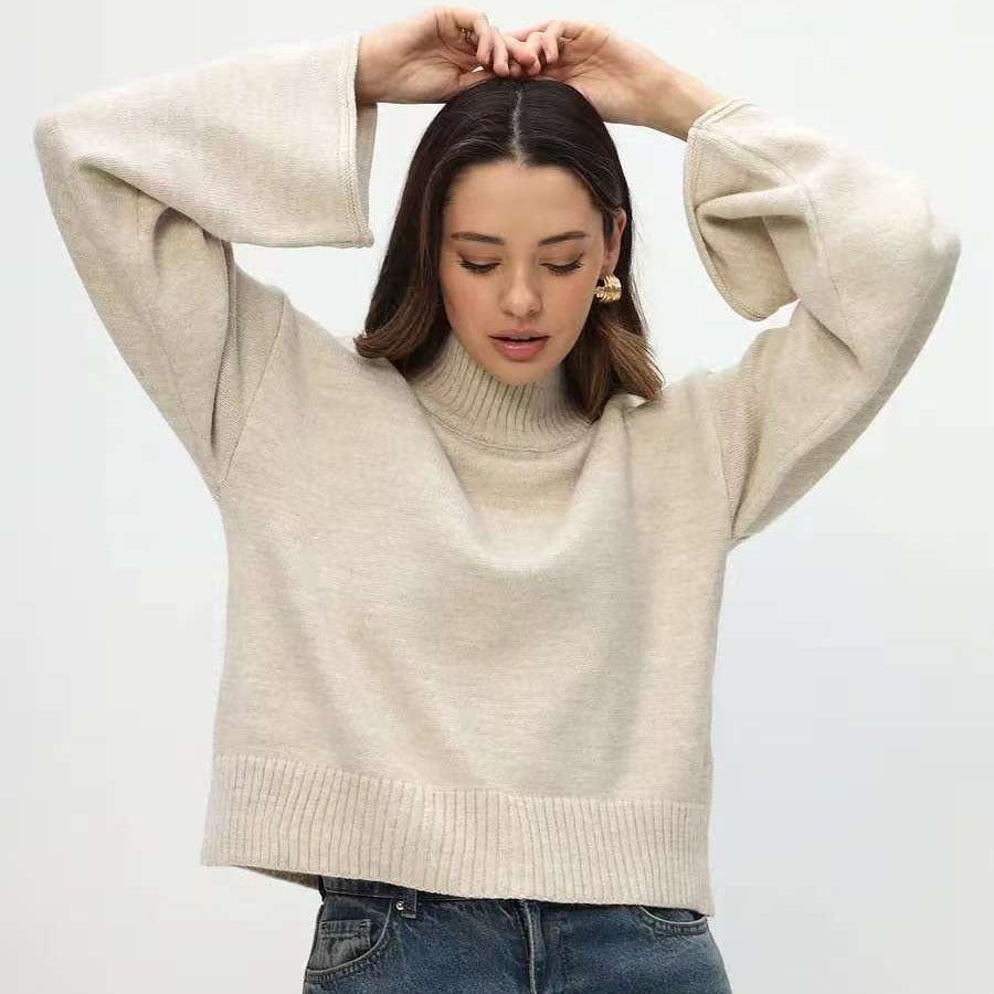 Pull en maille épaisse pour femme avec col montant et manches volumineuses Chic & Stil