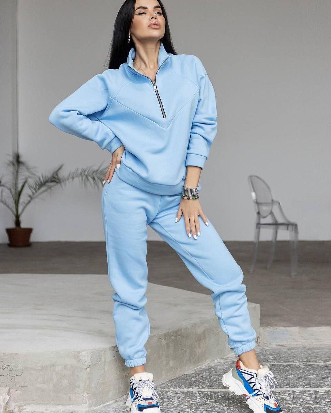 Women's sports training jacket with high collar and practical pockets Lune London