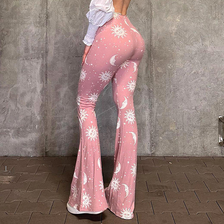 Flared yoga pants for women with a fun moon and sun pattern Lune London