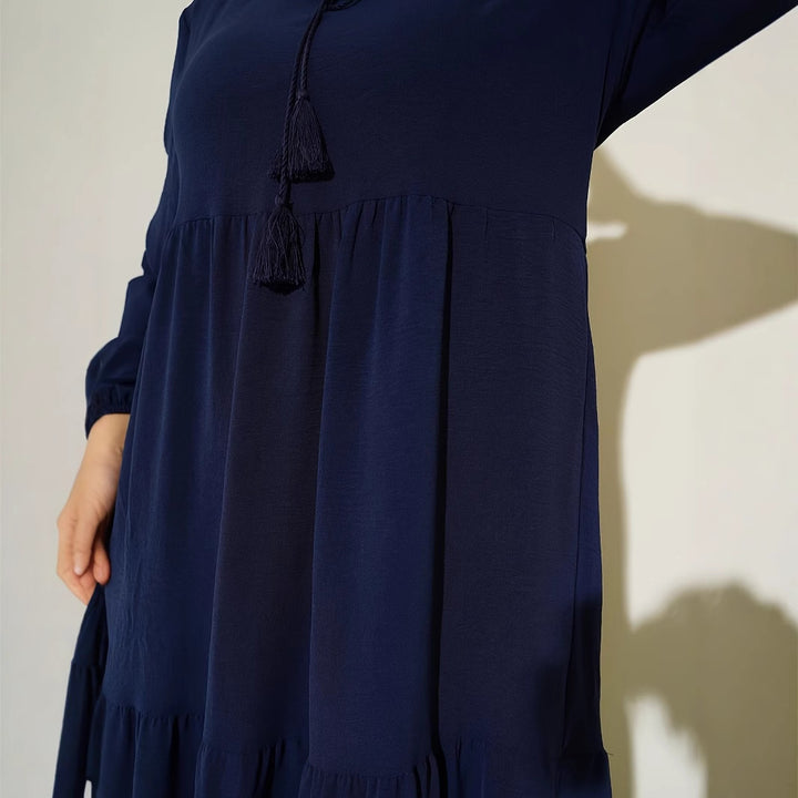Maxi dress for women with voluminous skirt and fine fringes Lune London