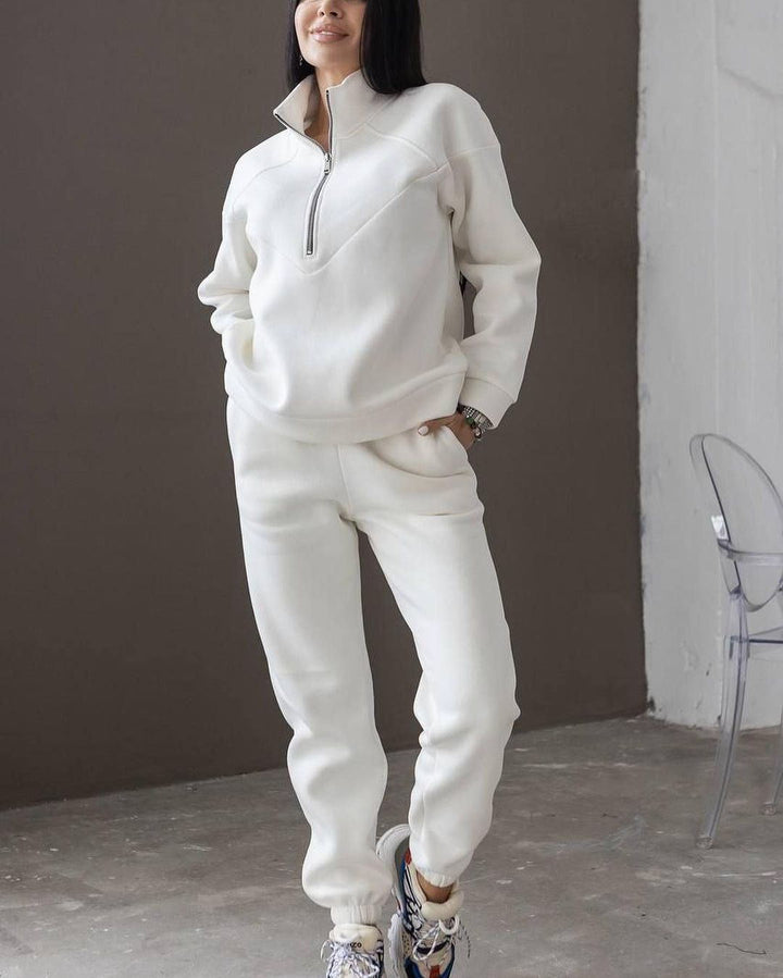 Women's sports training jacket with high collar and practical pockets Lune London