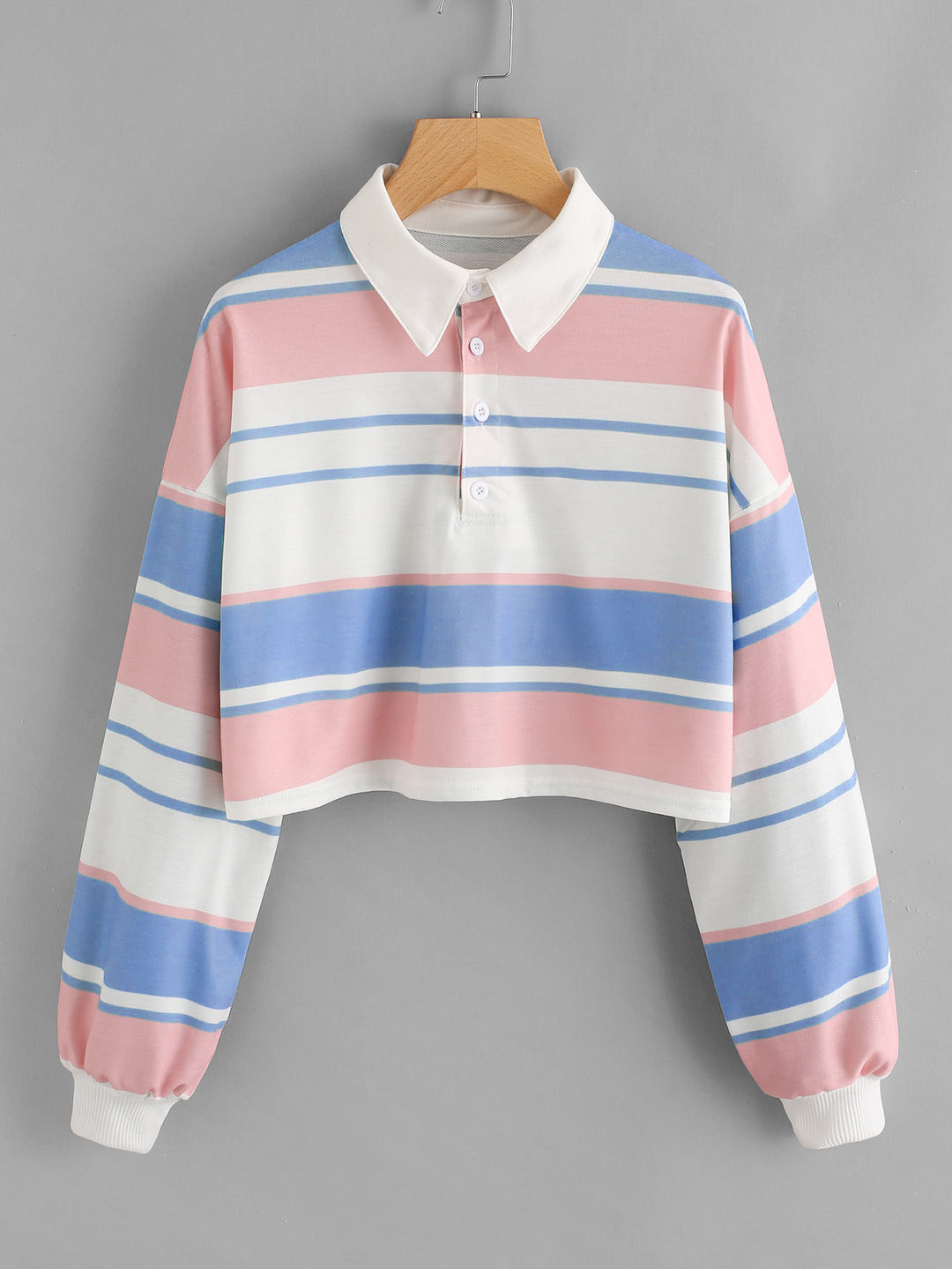 Women's polo shirt in a casual crop design with a stylish color block pattern Chic & Stil