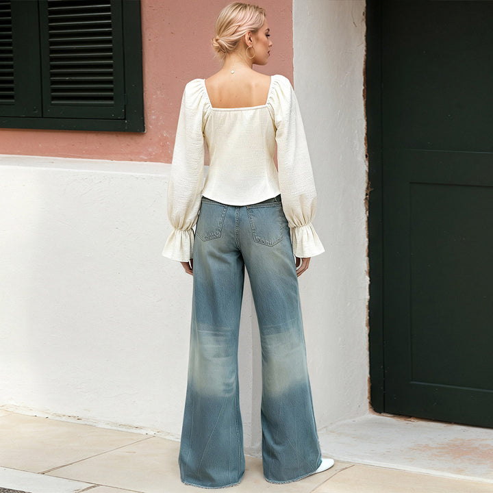 Blouse pour femme avec des manches à volants inhabituelles et une silhouette ajustée Chic & Stil