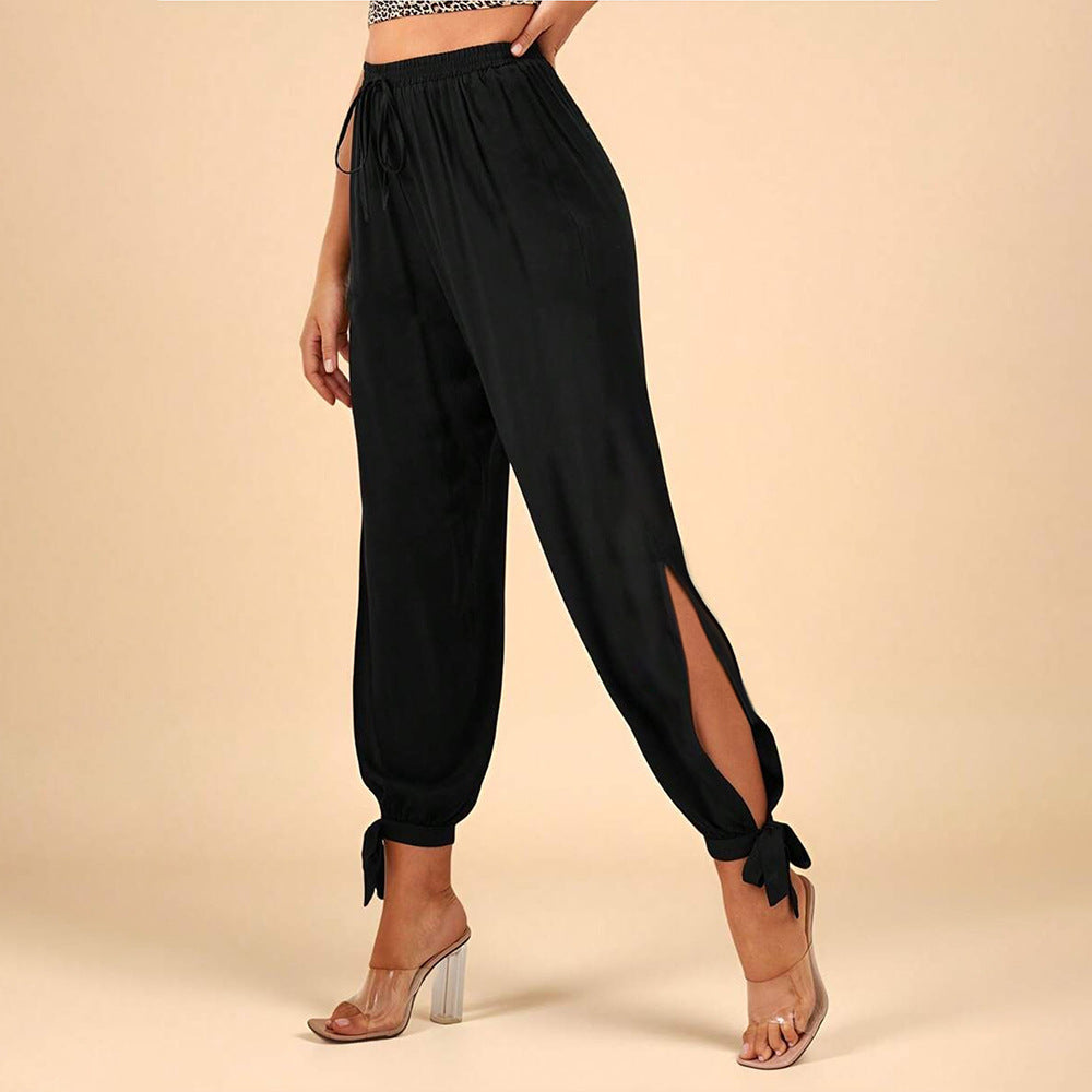 Chic & Stil Elegant women's trousers with side slits and drawstring