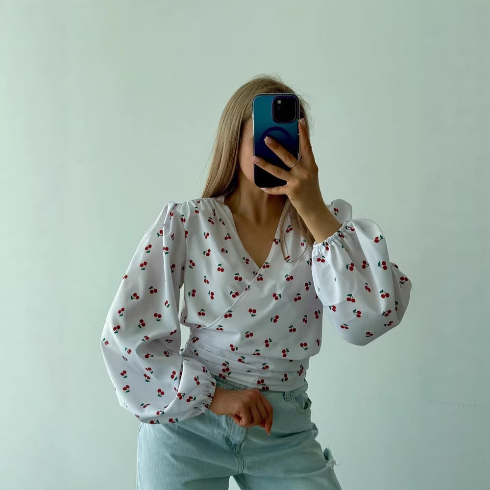 Women's wrap blouse with cherry print, wide puff sleeves & tie belt Amarae