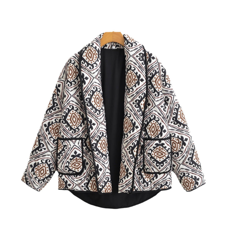 Veste matelassée élégante pour femmes avec ceinture à la taille et manches larges Chic & Stil