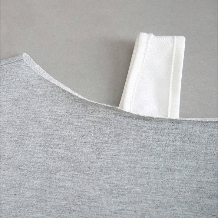 Sweat-shirt court pour femmes avec design asymétrique et manches volumineuses Chic & Stil