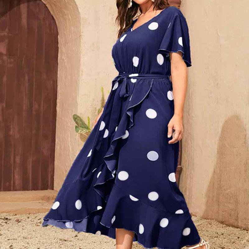 Maxi dress for women with a playful polka dot pattern and a fitted belt Lune London
