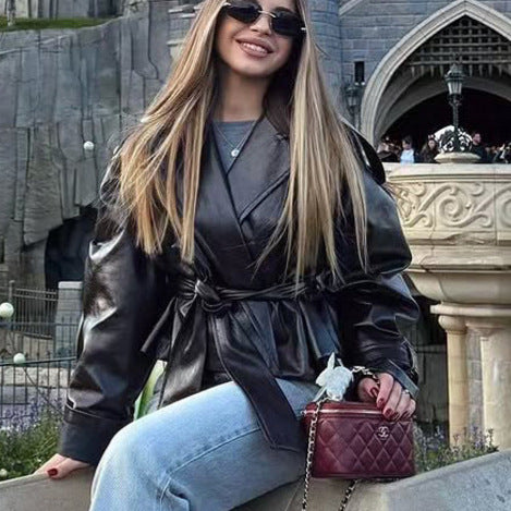 Women's Short Faux Leather Wrap Jacket with Waist Belt and Oversized Lapel Amarae