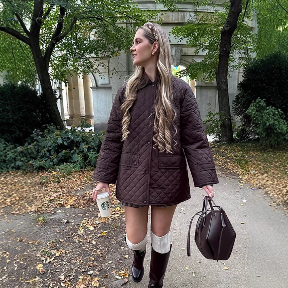 Women's oversized quilted jacket in coat style with snap button placket and patch flap pockets Amarae