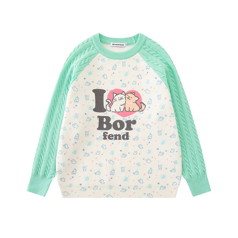 Women's knitted sweater with raglan sleeves, cable pattern sleeves and cartoon cat front print Amarae