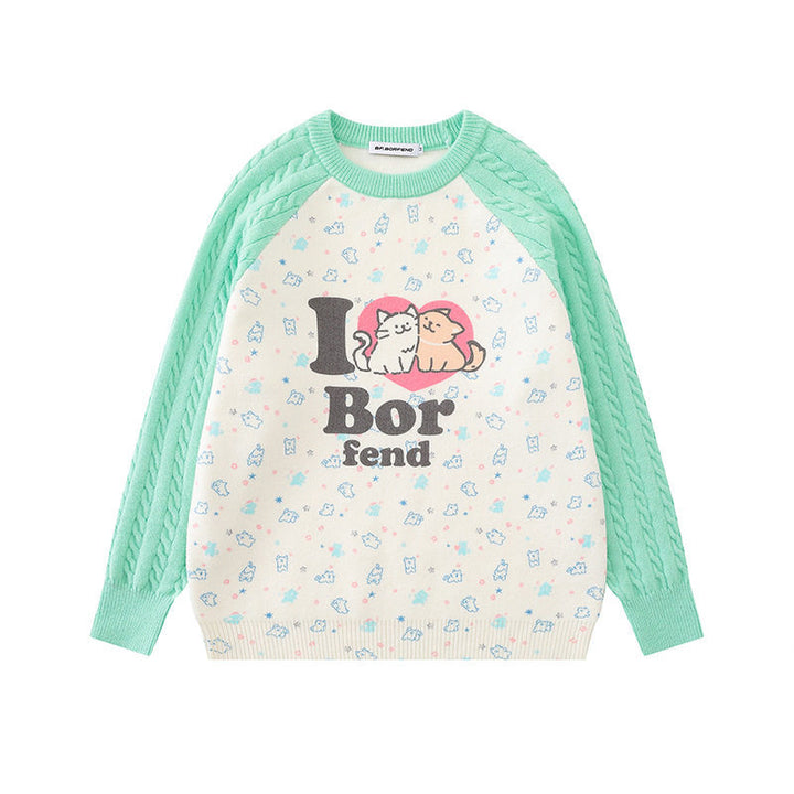 Women's knitted sweater with raglan sleeves, cable pattern sleeves and cartoon cat front print Amarae
