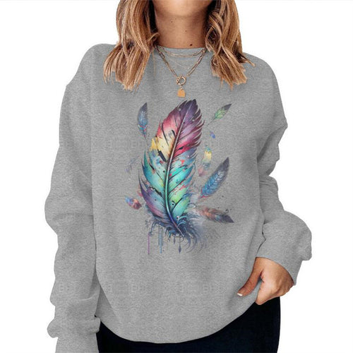 Sweatshirt pour femmes avec un design de plumes colorées et une coupe décontractée Chic & Stil