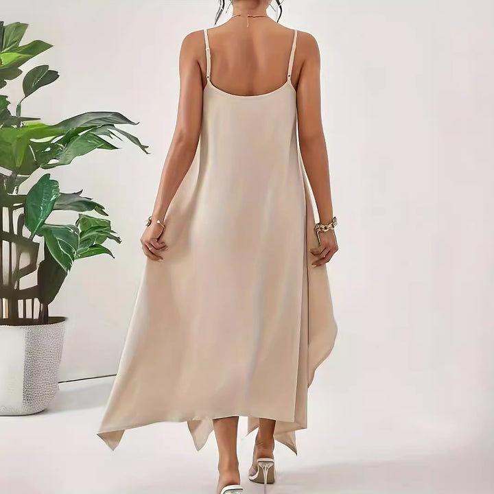 Airy spaghetti strap dress for women with asymmetrical hem and soft fabric Lune London