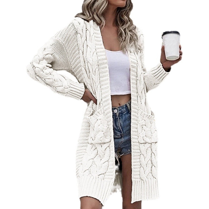 Knitted coat for women with an elegant textured pattern and practical pockets Lune London