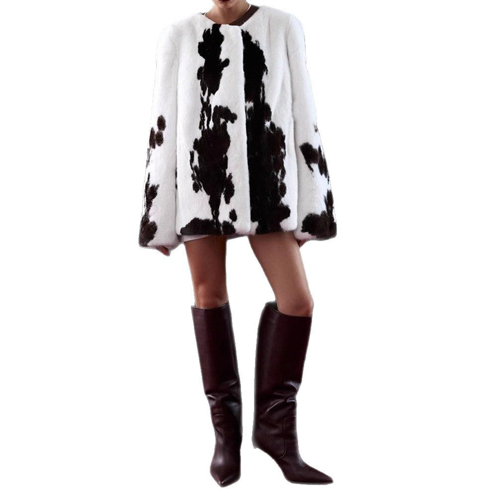 Women's short coat made of faux fur with boxy silhouette and cow print pattern Amarae