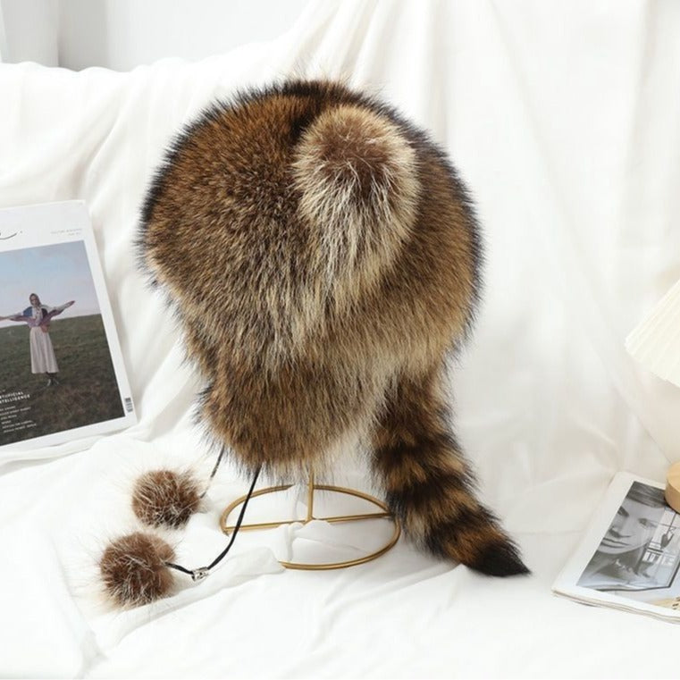 Women Cozy faux fur hat with side pom poms Lune London