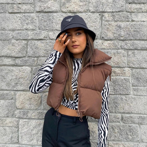 Quilted vest for women with high collar and practical pockets Amarae