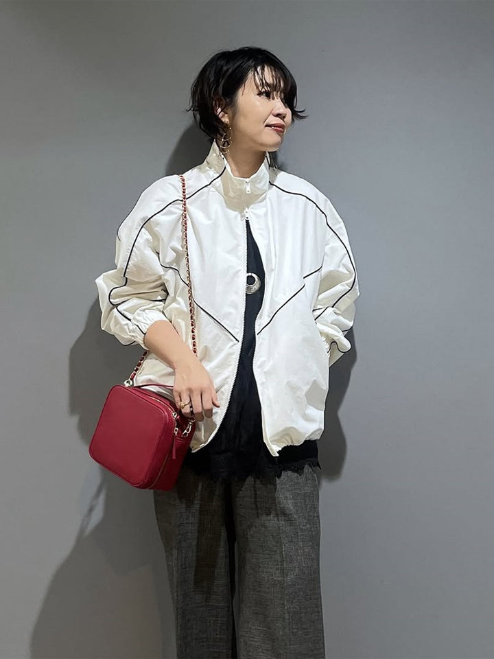 Women’s short bomber-style jacket with sculptural seam design and high stand-up collar Amarae